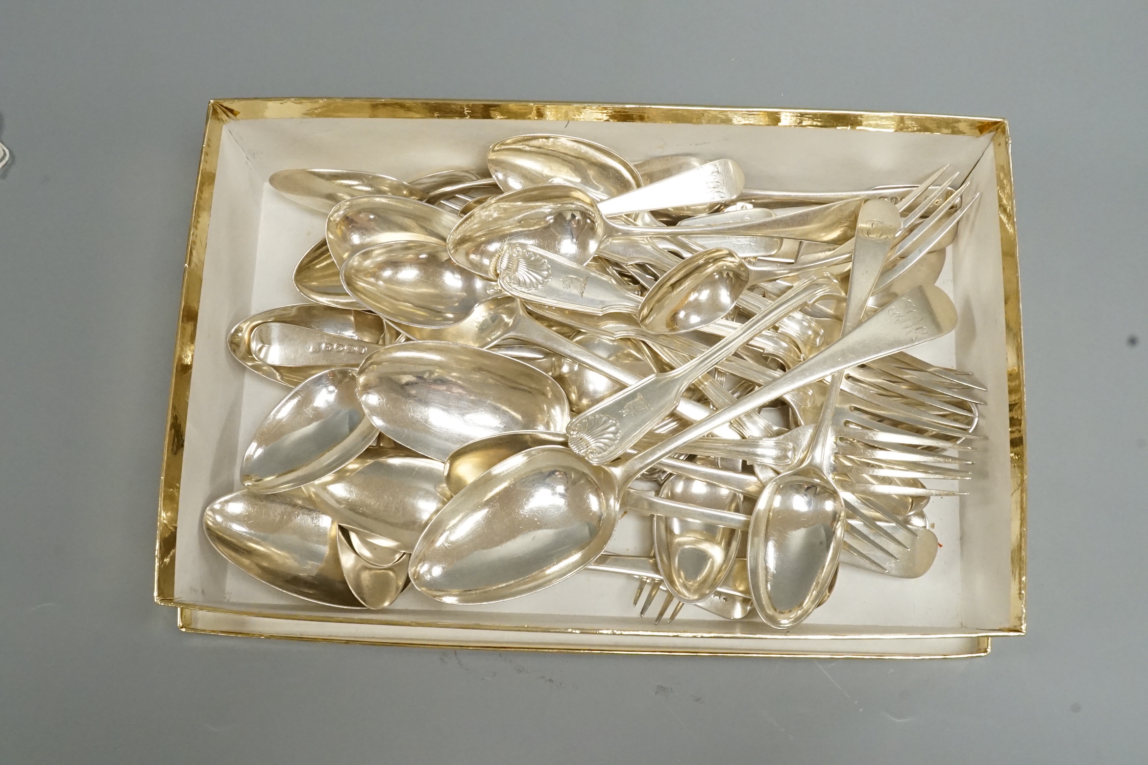 A quantity of assorted 19th century and later silver and sterling flatware, various patterns, makers and date, 47.5oz.